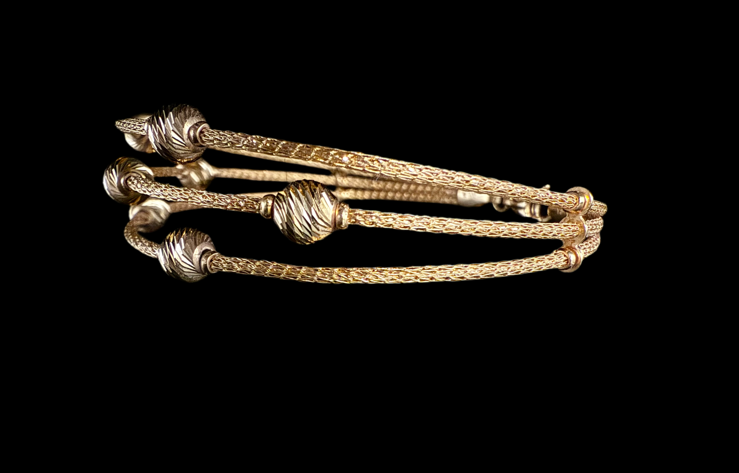 Sleek Cuff Bracelet with Gold Balls