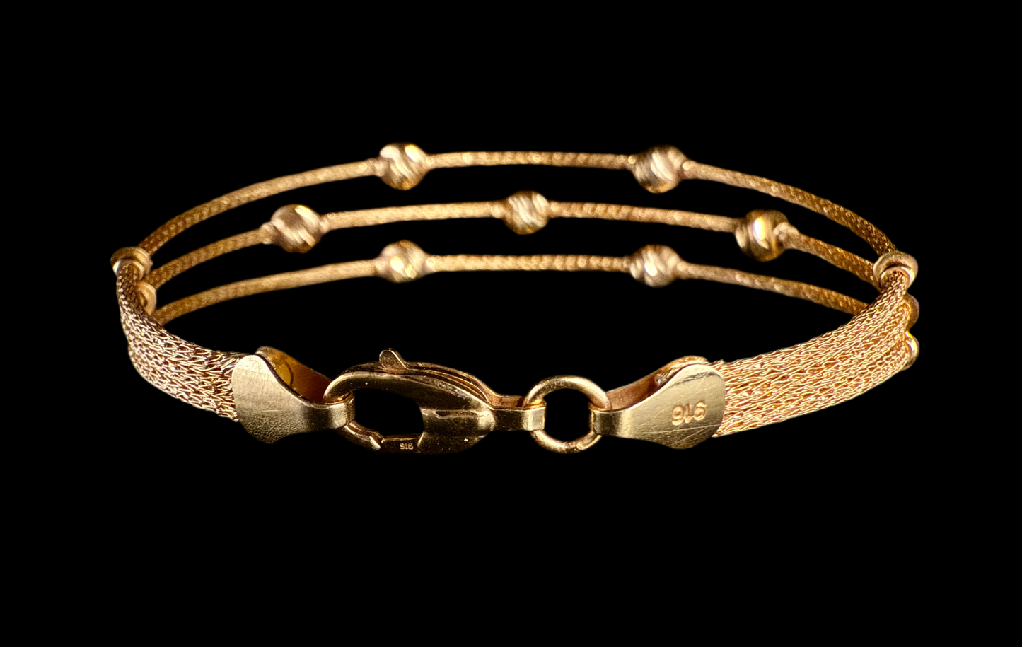 Sleek Cuff Bracelet with Gold Balls