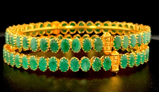 Exemplifying Emerald Bangles