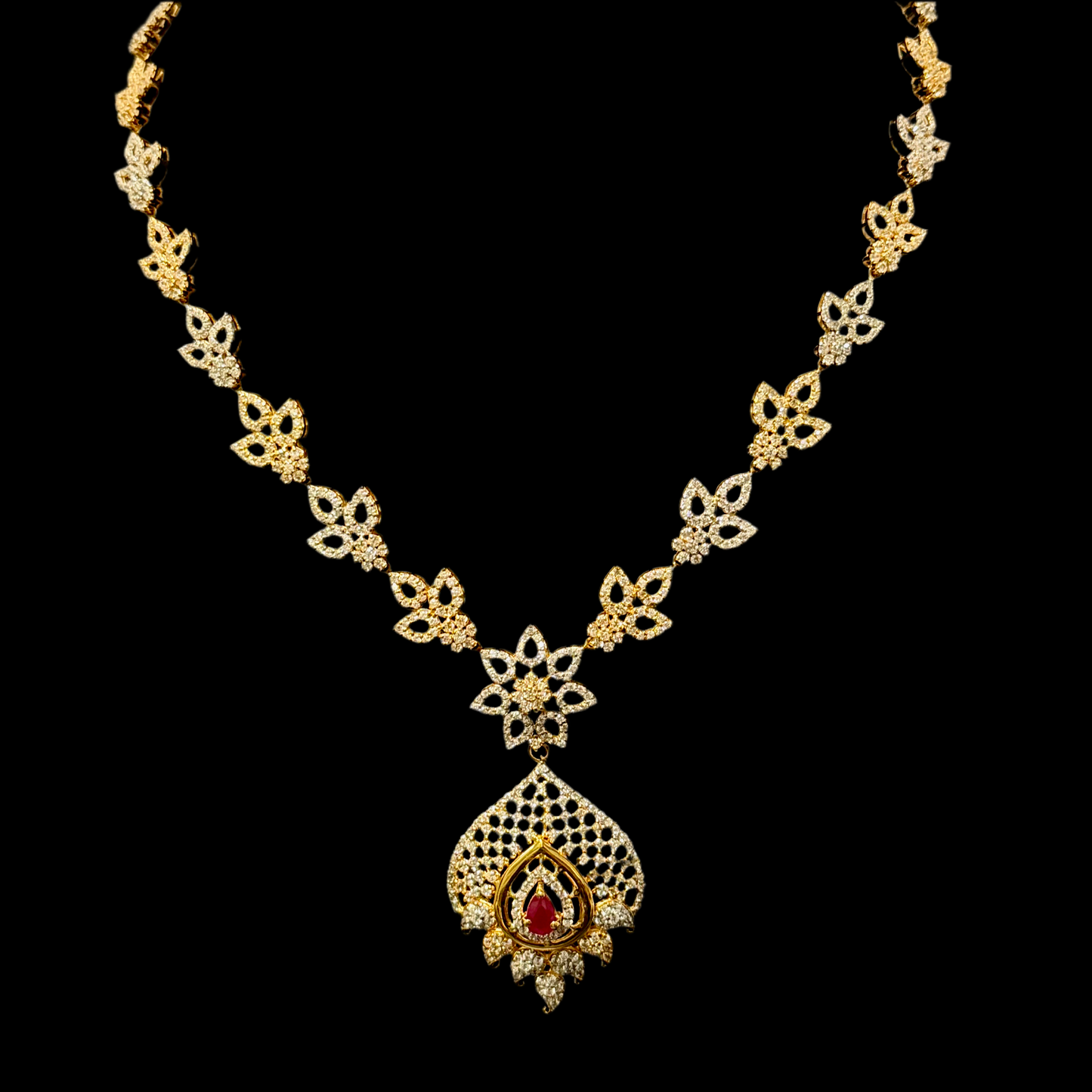 Glittering Cubic Zarconia Necklace with Singular Ruby Colored Stone