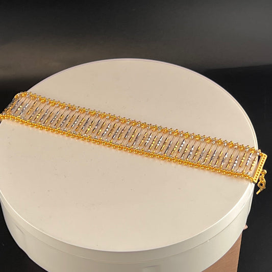 Flattering & Flexible Gold Bracelet with Contrasting Rhodium