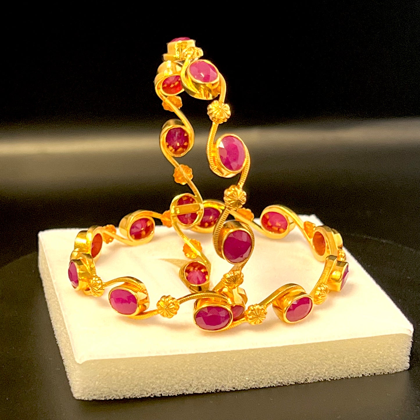 Glamorous Ruby Bangles with Curvy Golden Strings