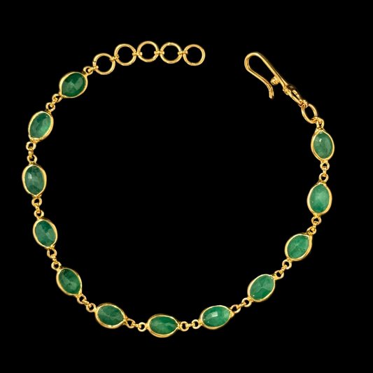 Oval Shaped Emerald Gold Cuff Bracelet