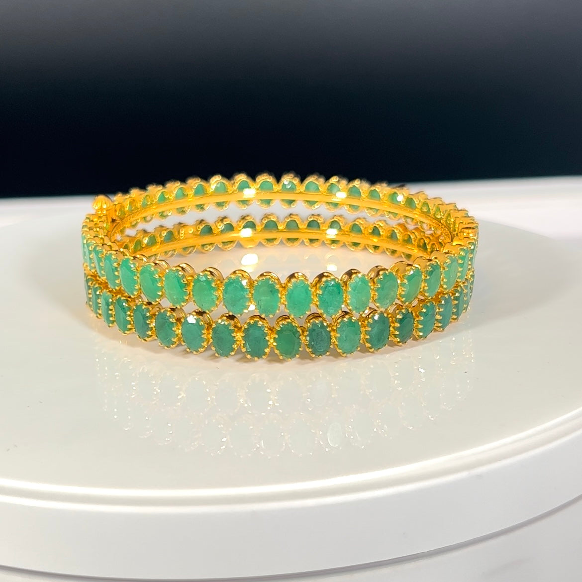 Emerald bangles store in gold