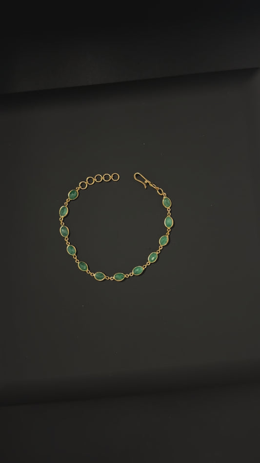 Oval Shaped Emerald Gold Cuff Bracelet