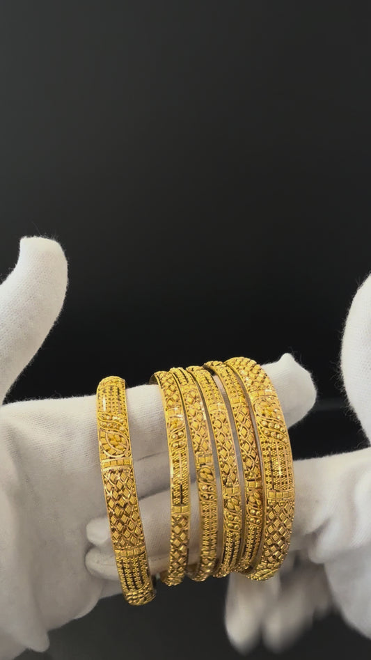Masterful Leaf-Patterned Gold Bangle Set