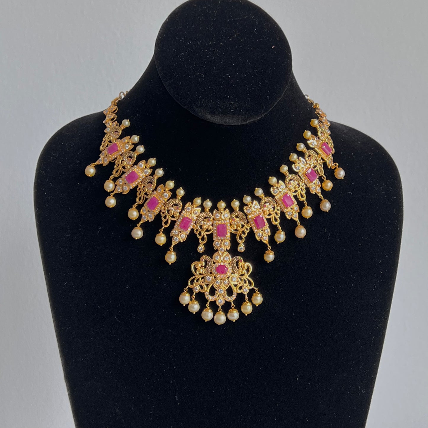 Glamorous Ruby and Cubic Zirconia Necklace Set with Hanging Seawater Pearls