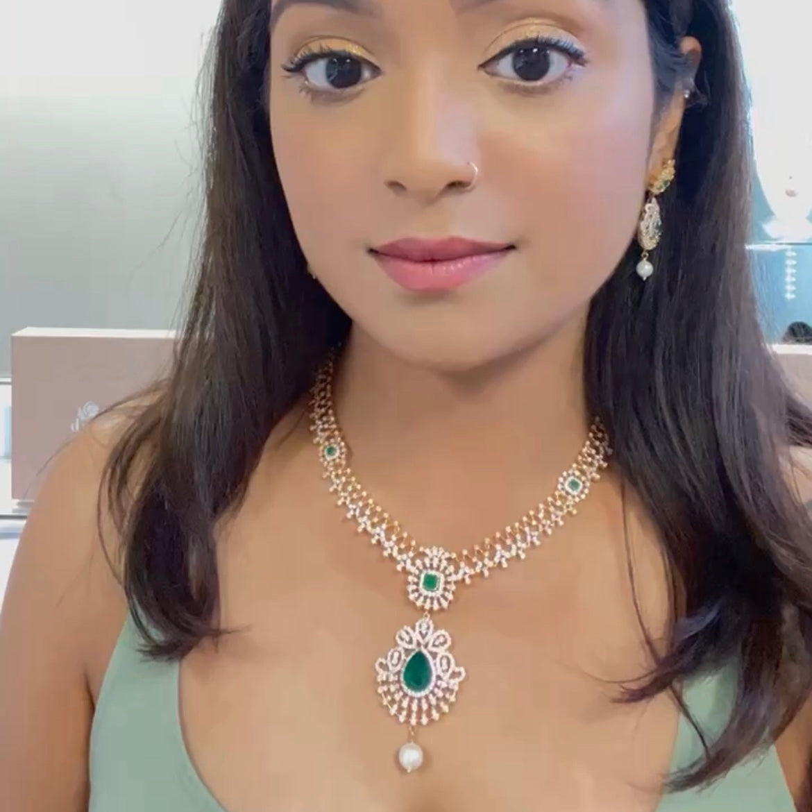 Glitzy Cubic Zarconia Necklace Set with Eccentric Emerald Colored Stones