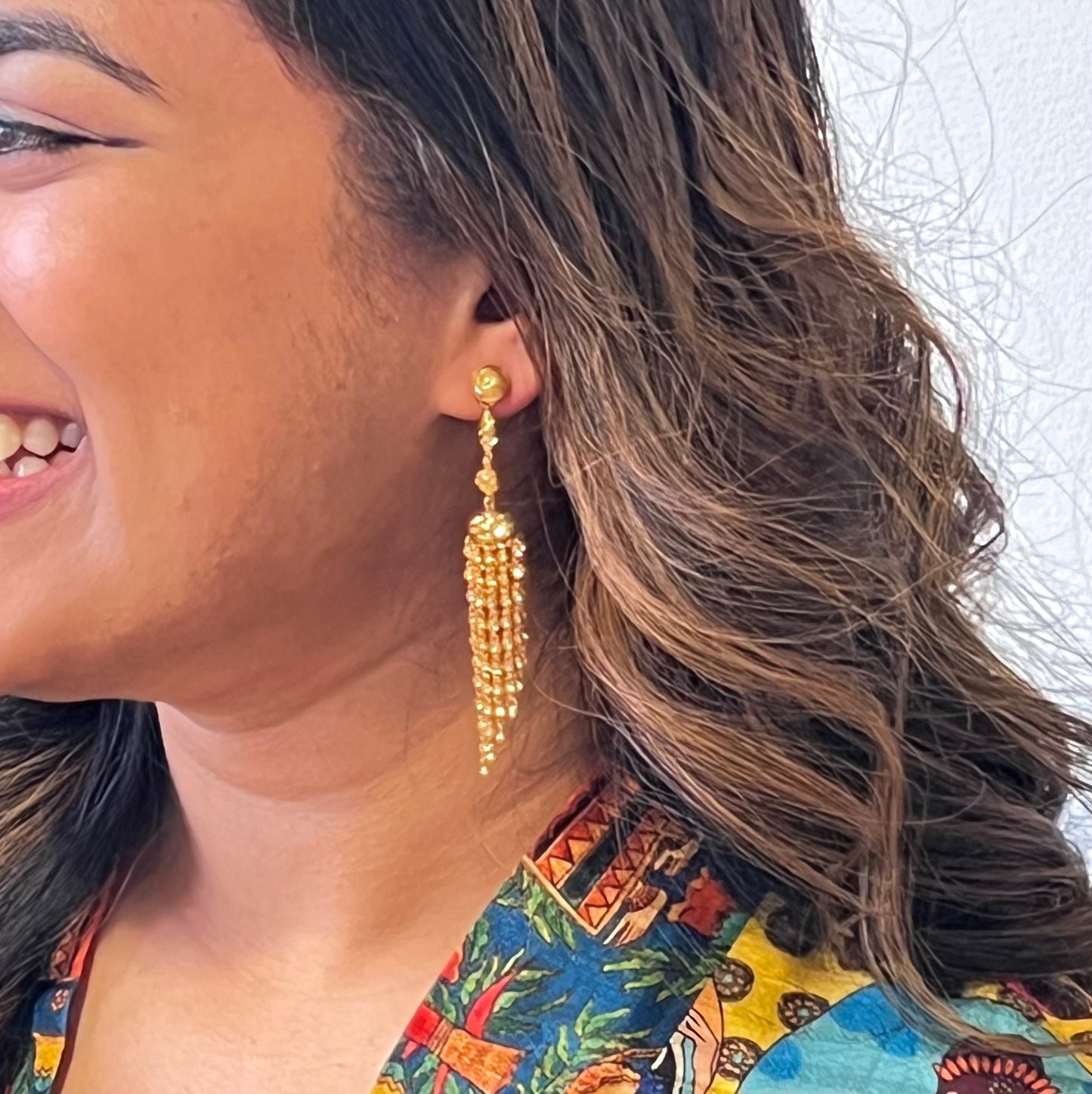 Dangling Gold Jhumka Earrings